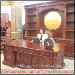 Bàn lãnh đạo mẫu tổng thống Mỹ gỗ gõ đỏ tại Bắc Ninh được PU màu giả Óc Chó phù hợp với nội thất gỗ Óc Chó